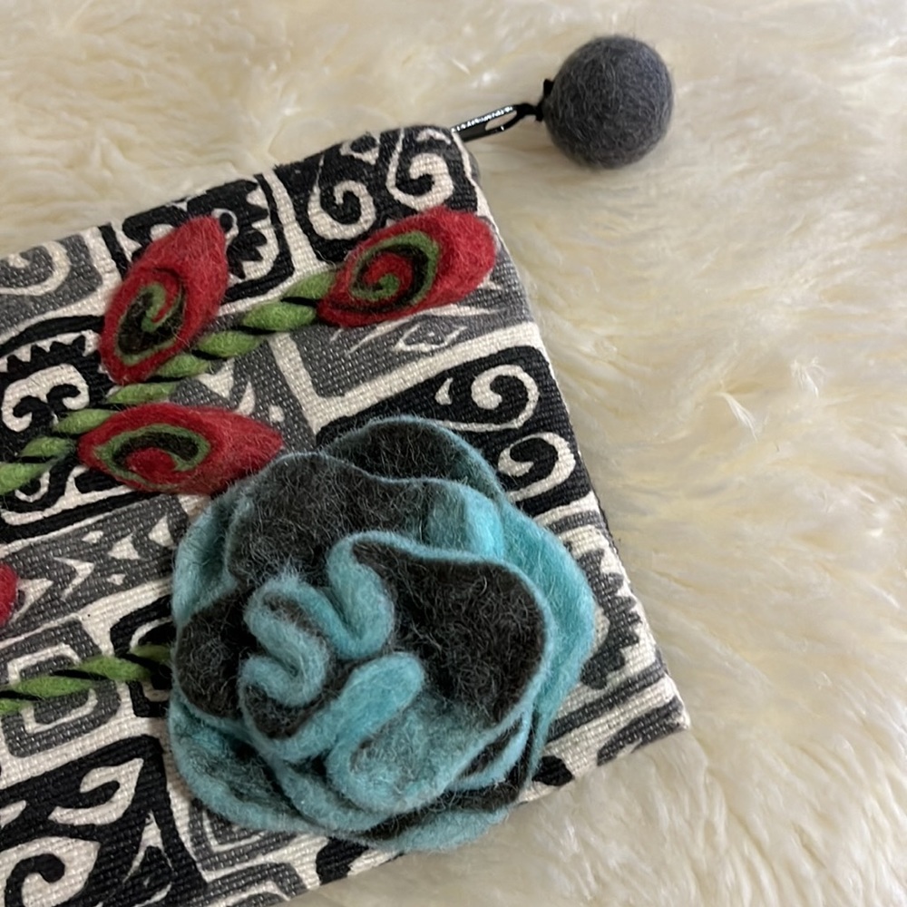 Rising Tide felt clutch bag/coin purse.